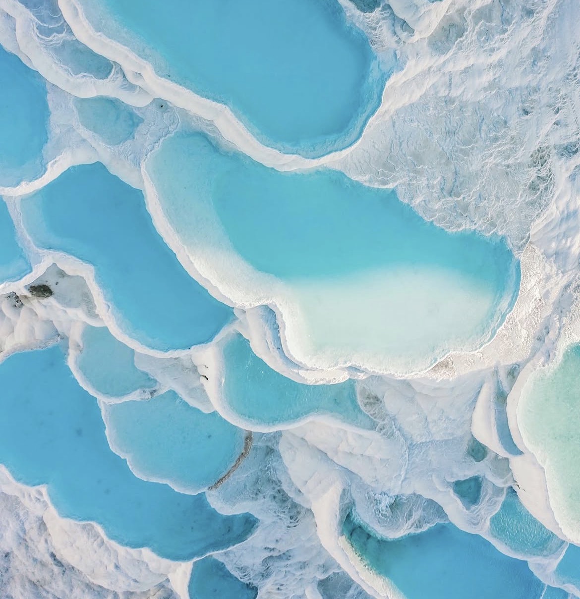Turquoise travertine pools of Pamukkale seen from above